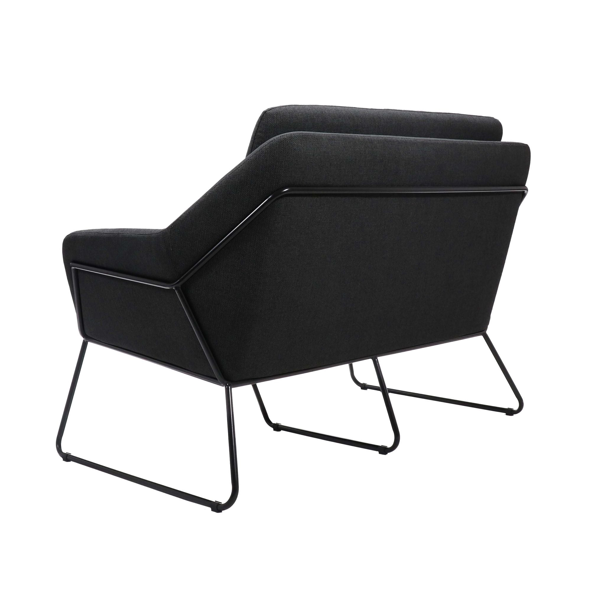 Black armchair with metal legs on a white background