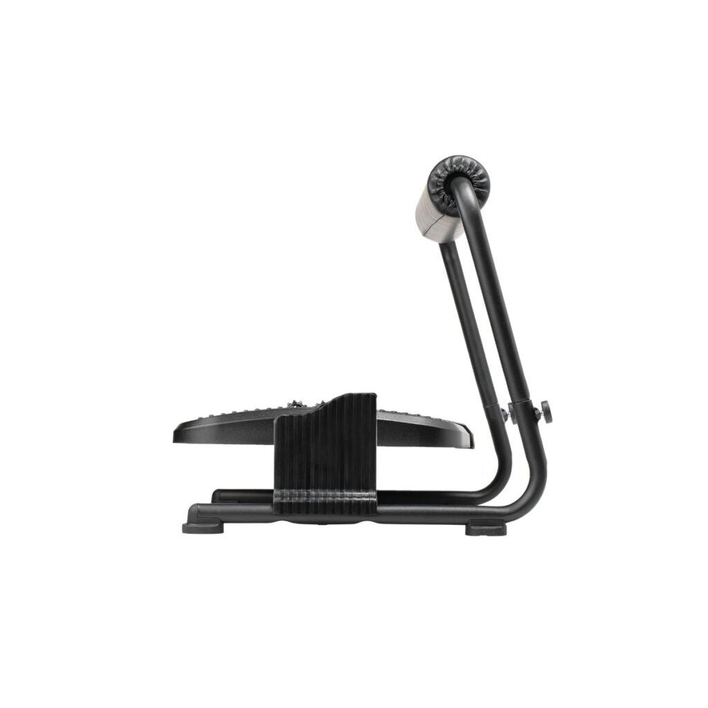 Black exercise pedal on a white background
