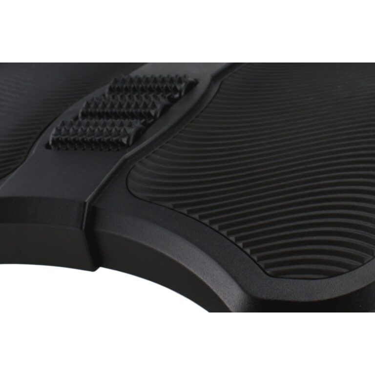 Close-up of a black shoe sole with textured design